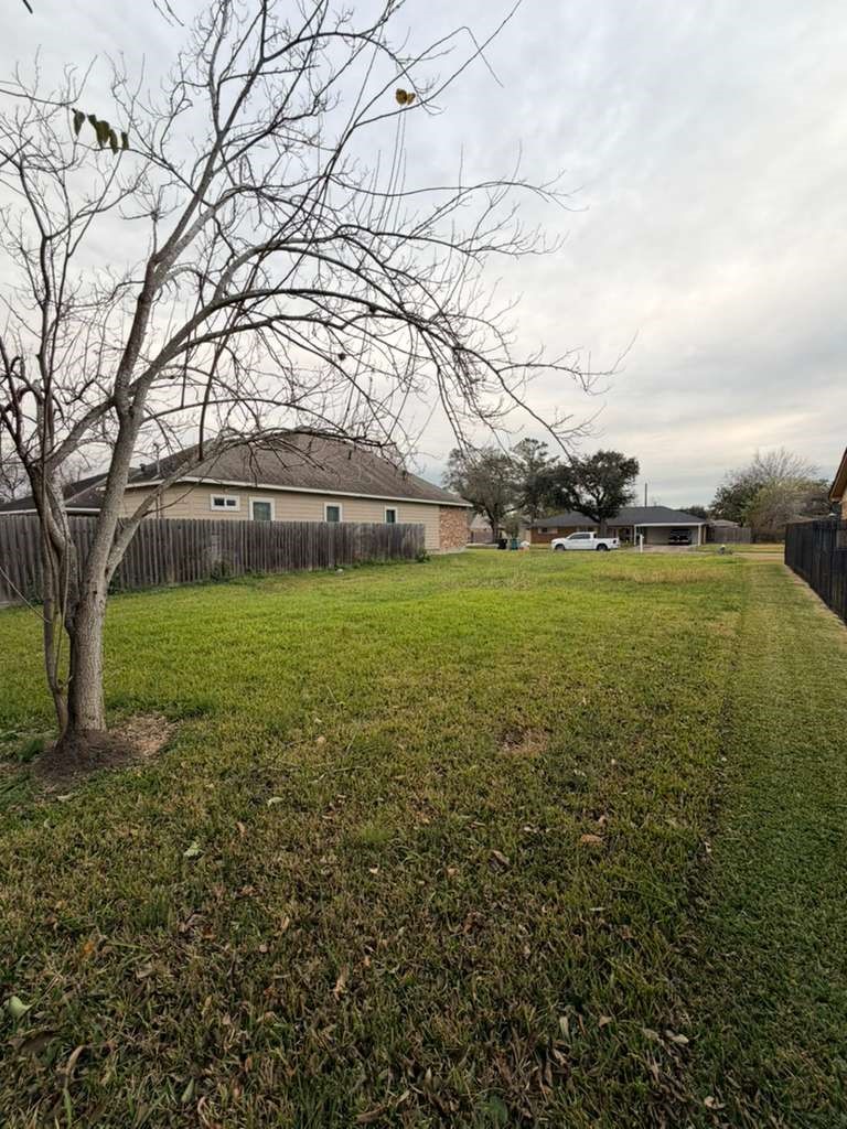 7135 Rook Boulevard Houston, TX 77087 - Photo 2 of 6 a view of a field with an trees