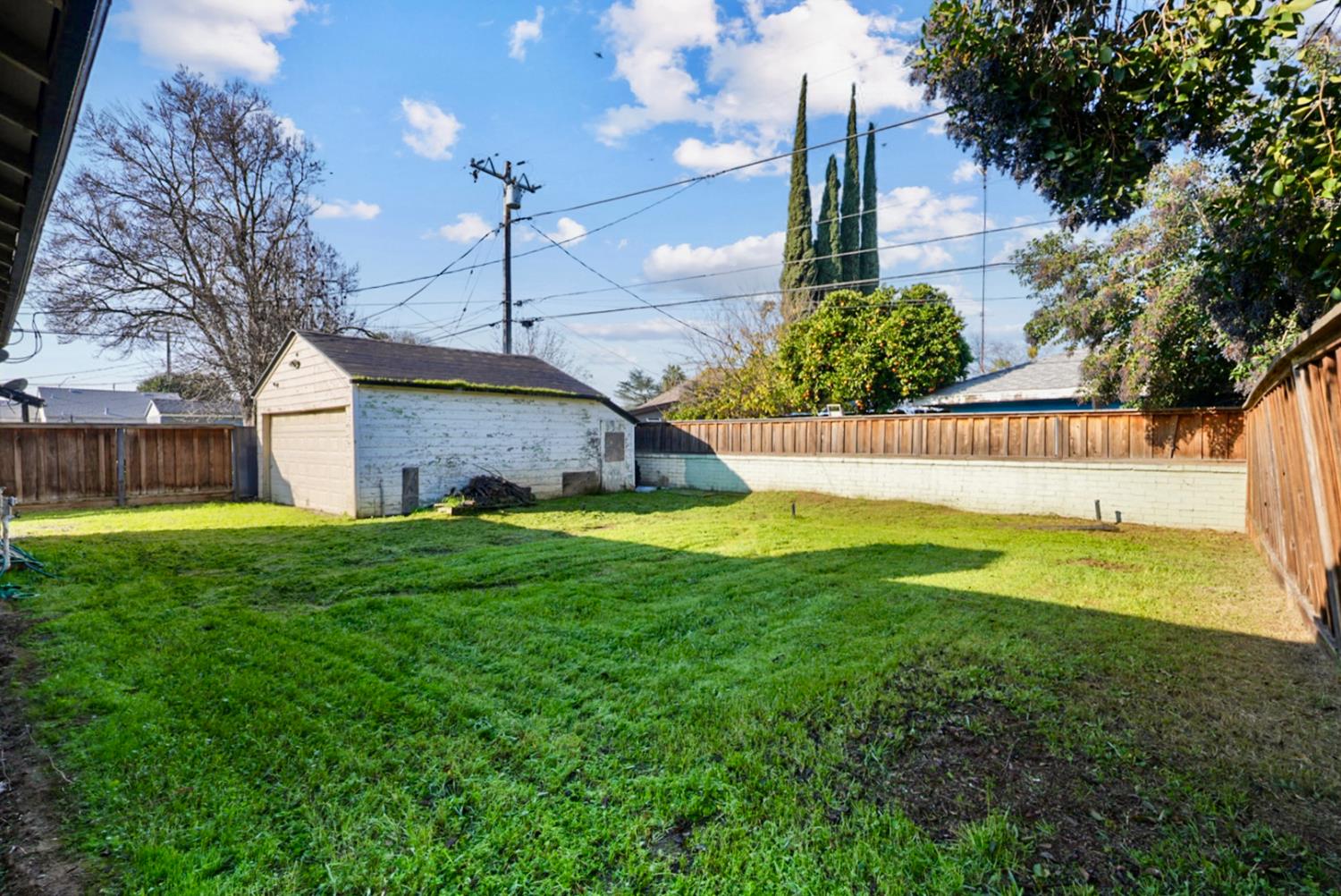 1899 Union Avenue Merced, CA 95340 - Photo 17 of 27 a view of a house with a yard and tree s