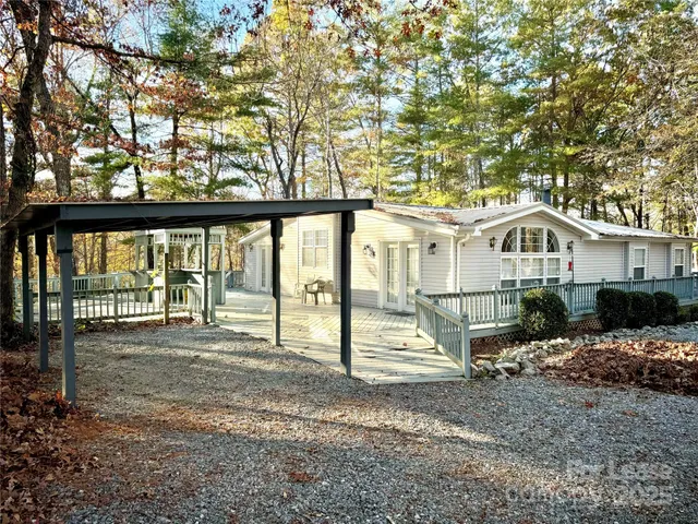 a house view with a backyard space
