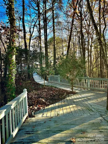 a view of a park with large trees