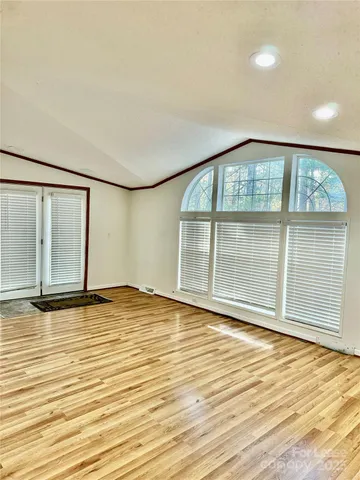 a view of a room with an empty space