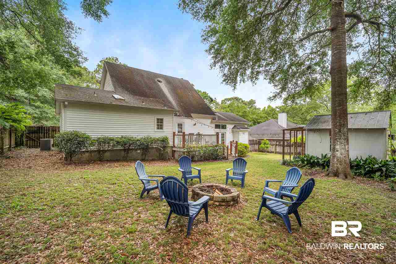 596 Ridgewood Drive Daphne, AL 36526 - Photo 24 of 29 Level lot w/fire pit