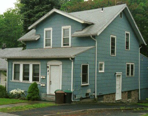 a view of a yard in front of a house