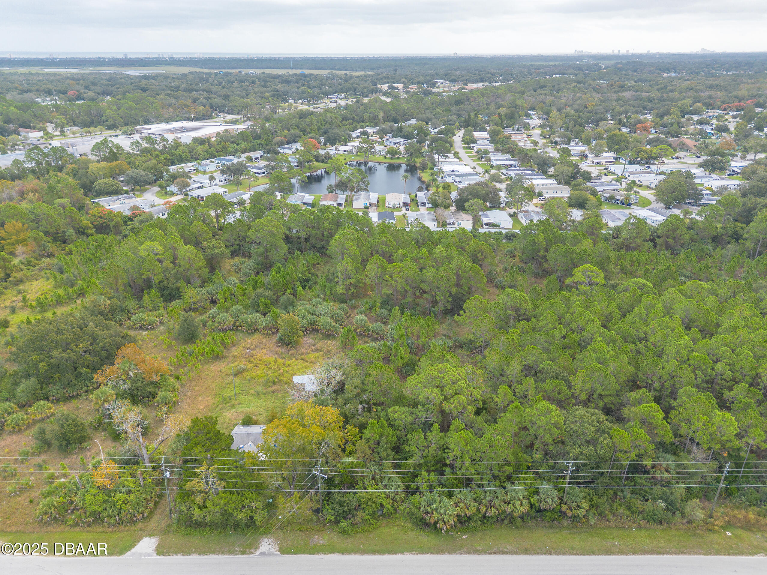 855 Hull Road Ormond Beach, FL 32174 - Photo 3 of 14 a view of city and mountain