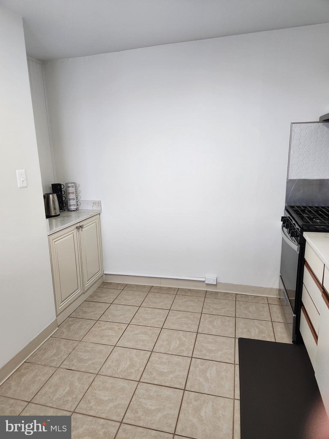 3900 West Ford Road, Unit 12A Philadelphia, PA 19131 - Photo 15 of 46 a view of an empty room and wooden floor