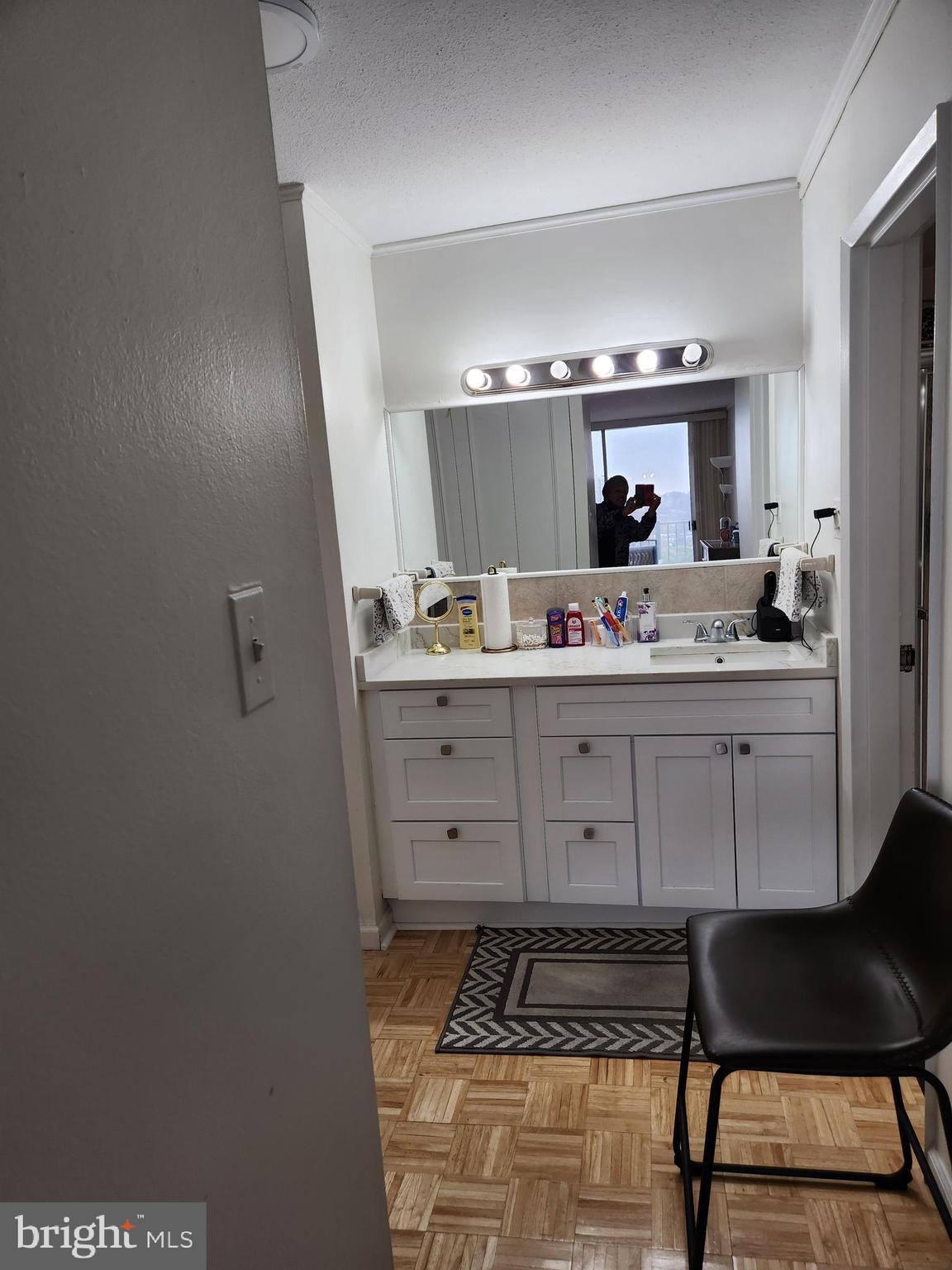 3900 West Ford Road, Unit 12A Philadelphia, PA 19131 - Photo 33 of 46 a bathroom with a sink and a mirror