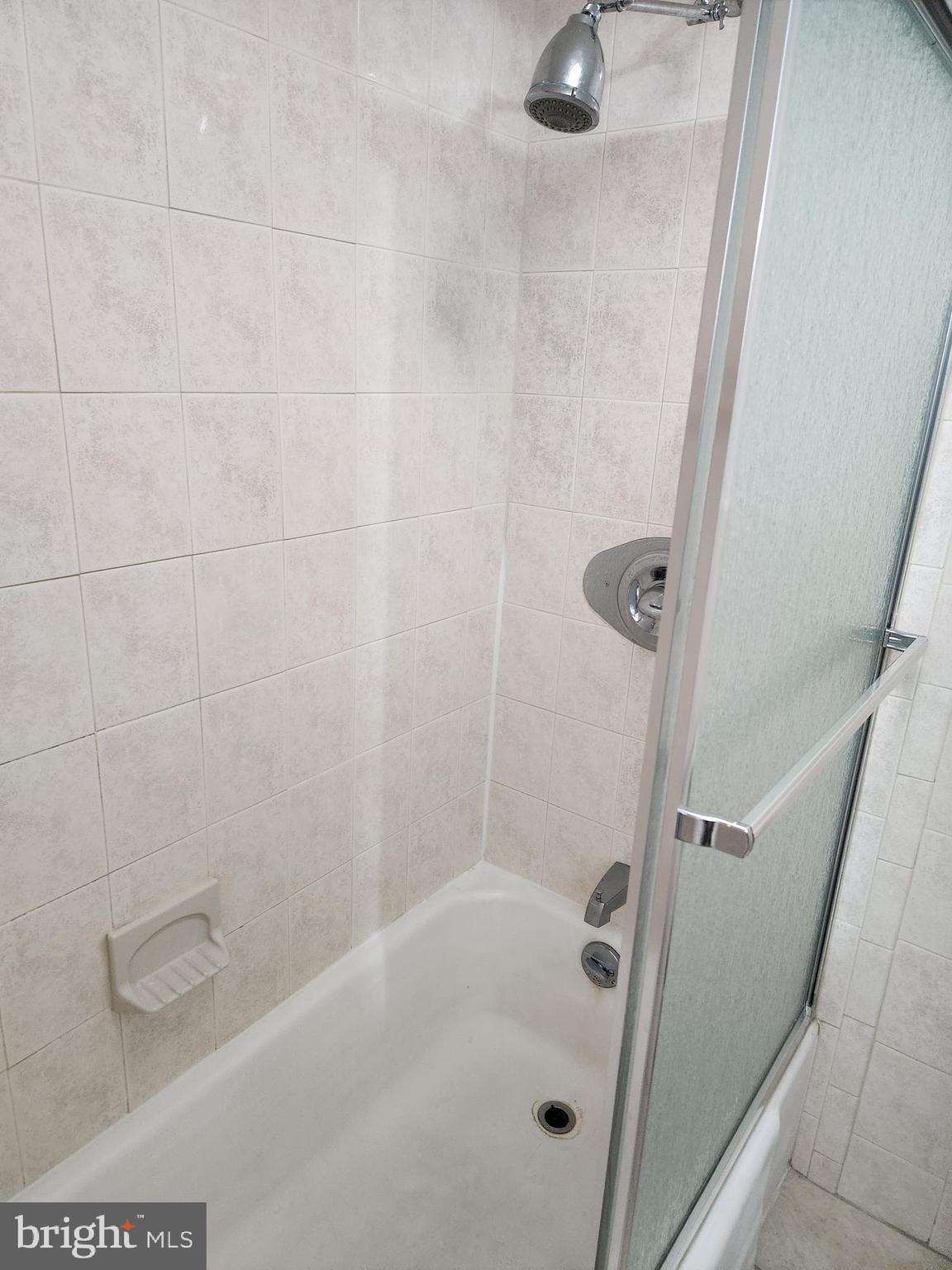 3900 West Ford Road, Unit 12A Philadelphia, PA 19131 - Photo 39 of 46 a bathroom with a shower