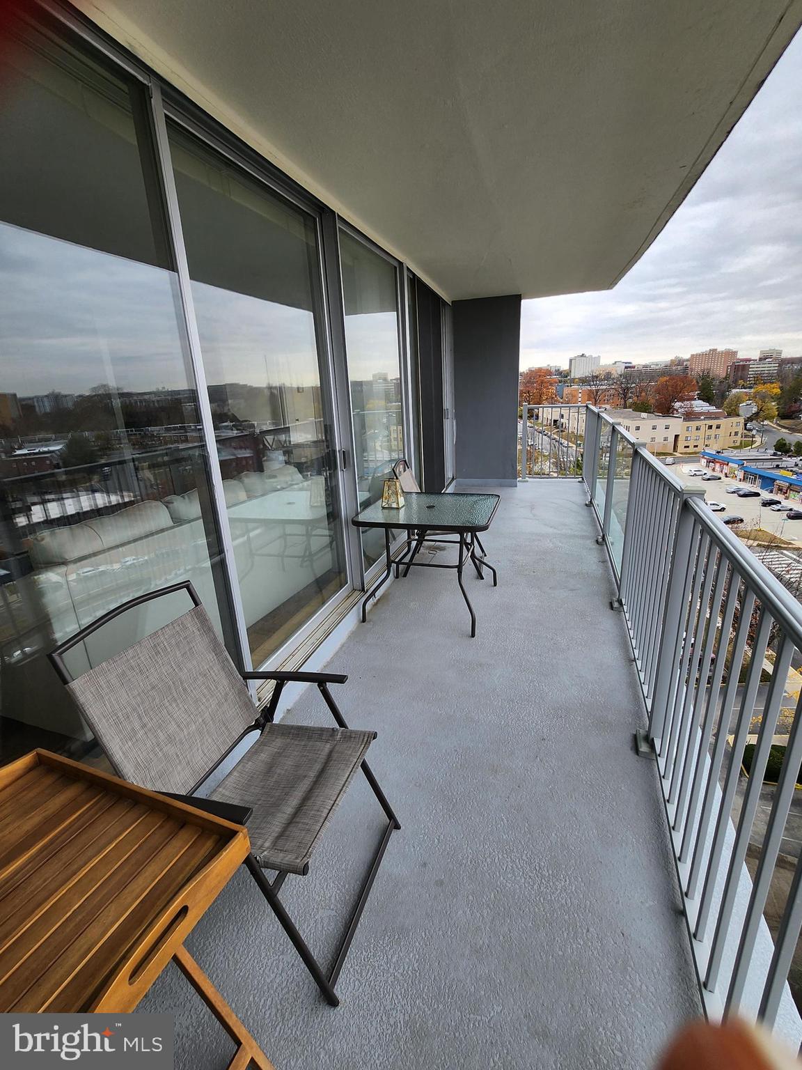 3900 West Ford Road, Unit 12A Philadelphia, PA 19131 - Photo 44 of 46 a view of a chairs and table in the balcony
