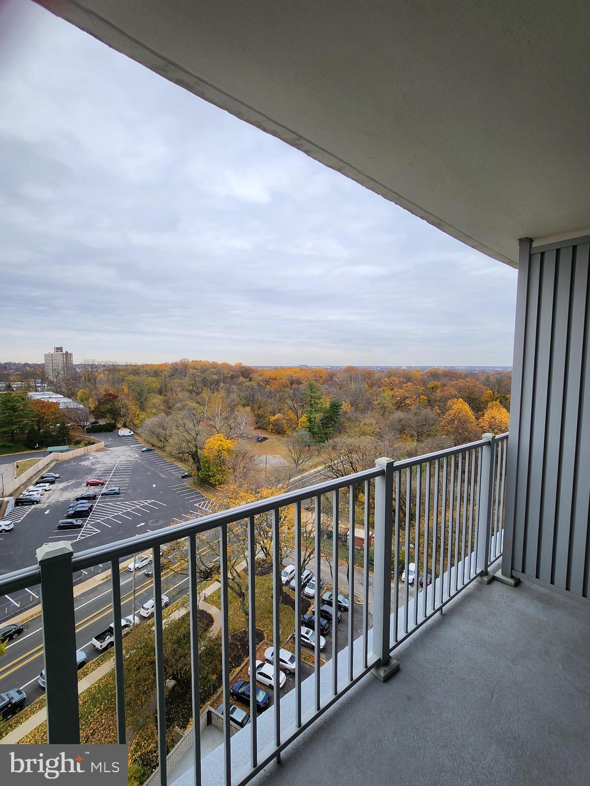 3900 West Ford Road, Unit 12A Philadelphia, PA 19131 - Photo 46 of 46 a view of city and mountain from a balcony