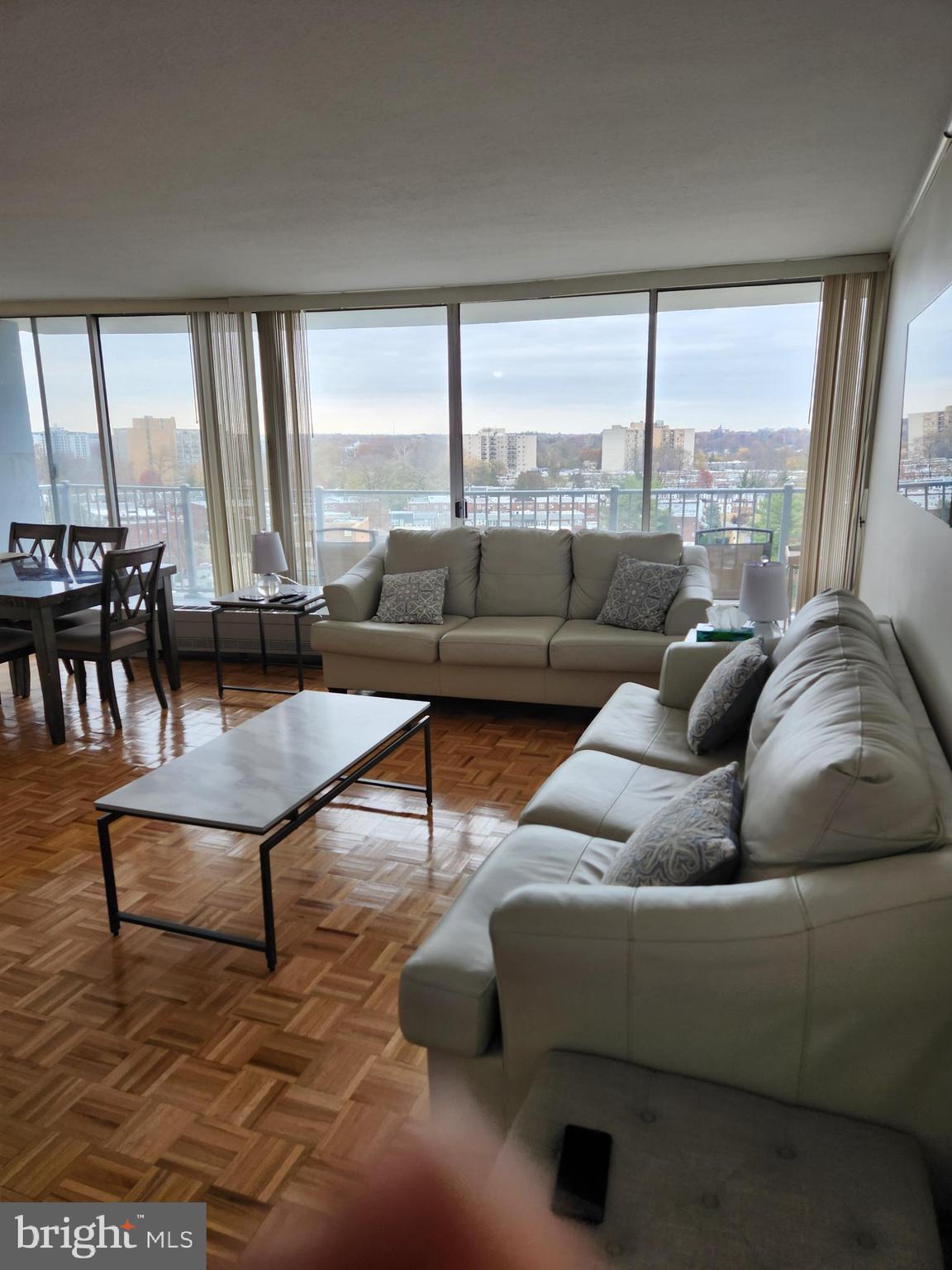 3900 West Ford Road, Unit 12A Philadelphia, PA 19131 - Photo 6 of 46 a living room with furniture and a large window