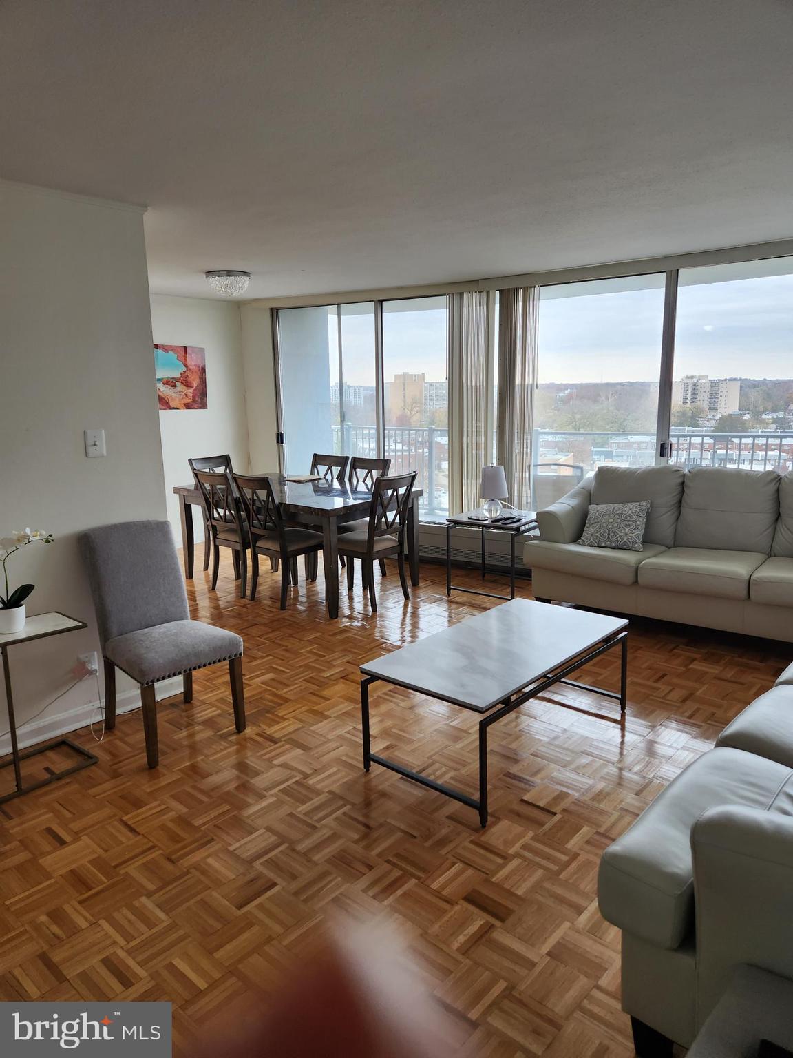3900 West Ford Road, Unit 12A Philadelphia, PA 19131 - Photo 7 of 46 a living room with furniture and a large window