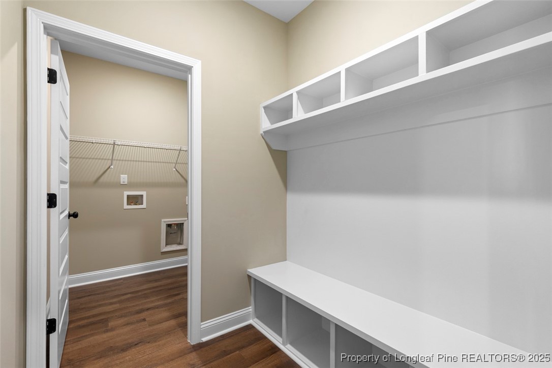 5578 Philippi Church Road Raeford, NC 28376 - Photo 17 of 33 a view of walk in closet with wooden floor