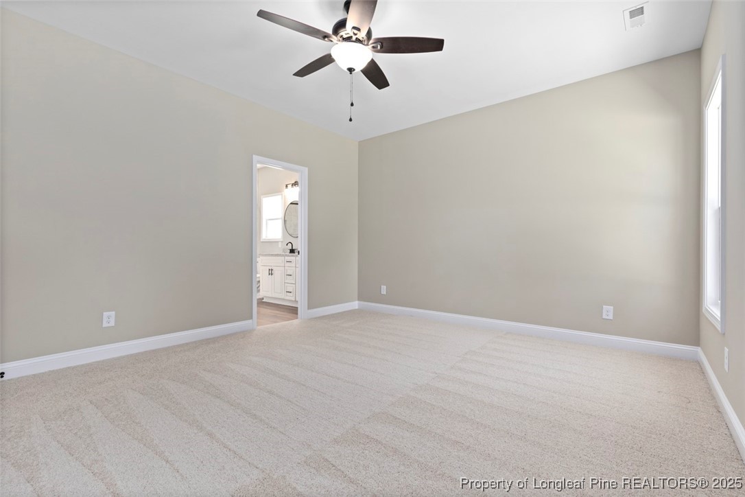 5578 Philippi Church Road Raeford, NC 28376 - Photo 29 of 33 a view of an empty room with a window