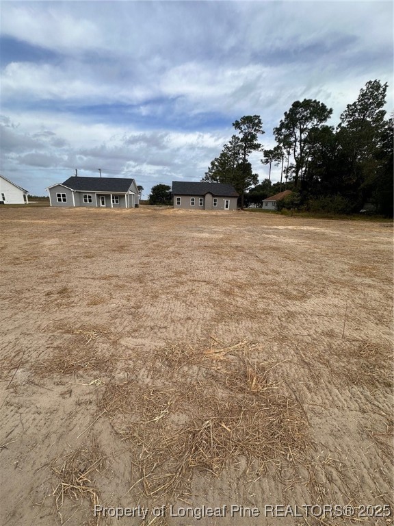 5578 Philippi Church Road Raeford, NC 28376 - Photo 4 of 33 a view of a pathway both side of building