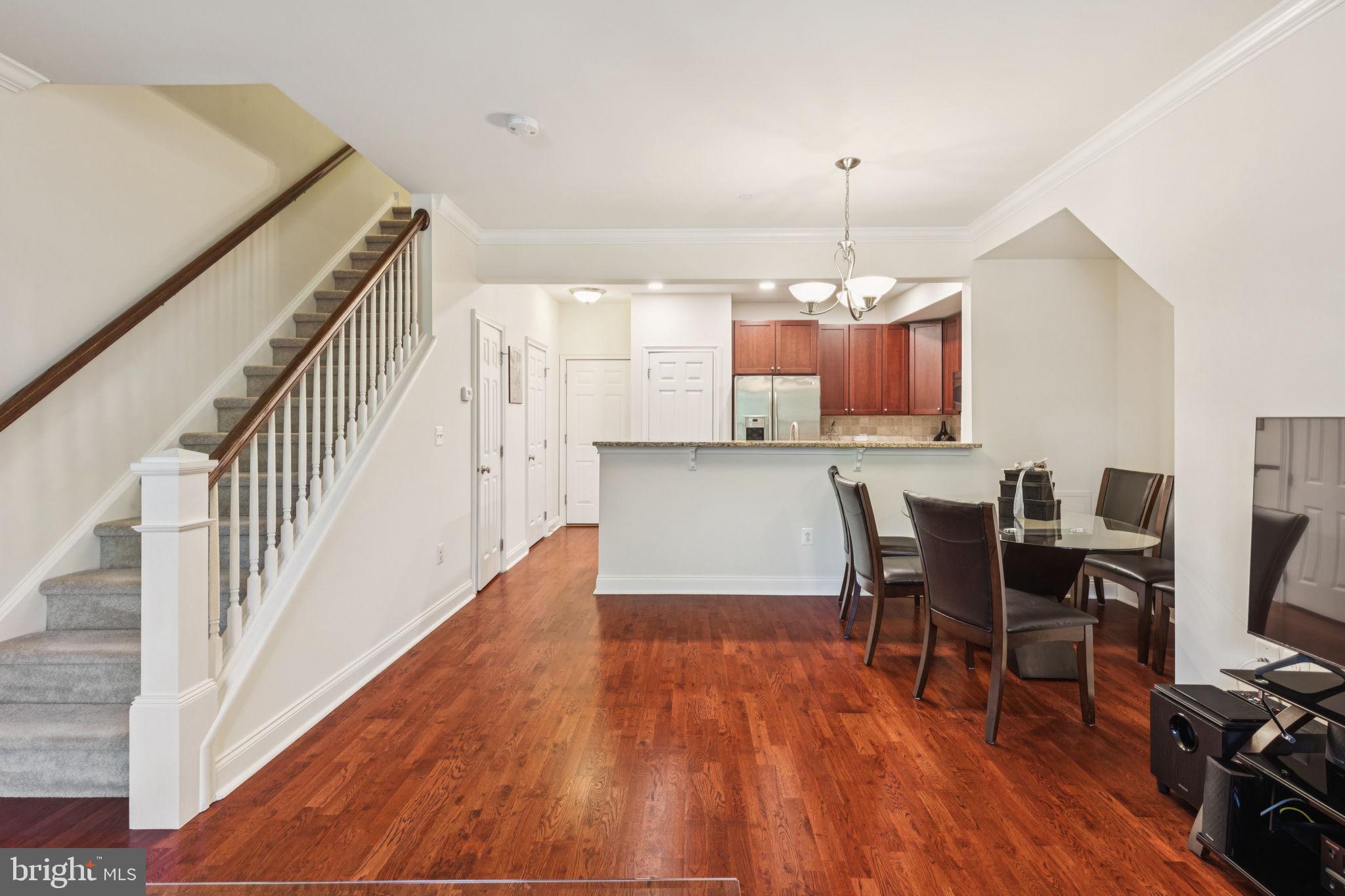 105 Commodore Court Philadelphia, PA 19146 - Photo 5 of 26 a view of a dining room with furniture window and wooden floor