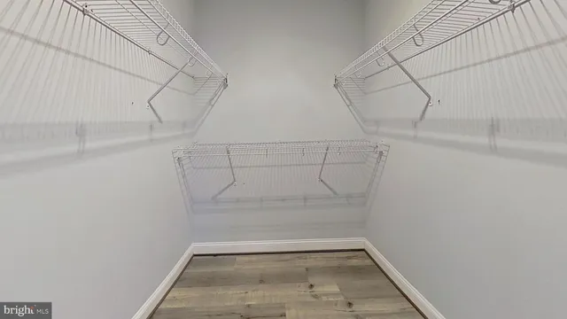 a view of a room with racks on the wall