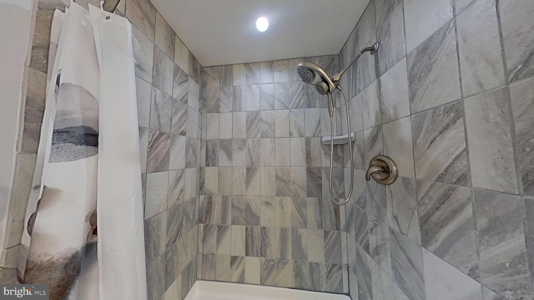 95 Rolando Drive Colonial Beach, VA 22443 - Photo 31 of 39 a bathroom with a shower