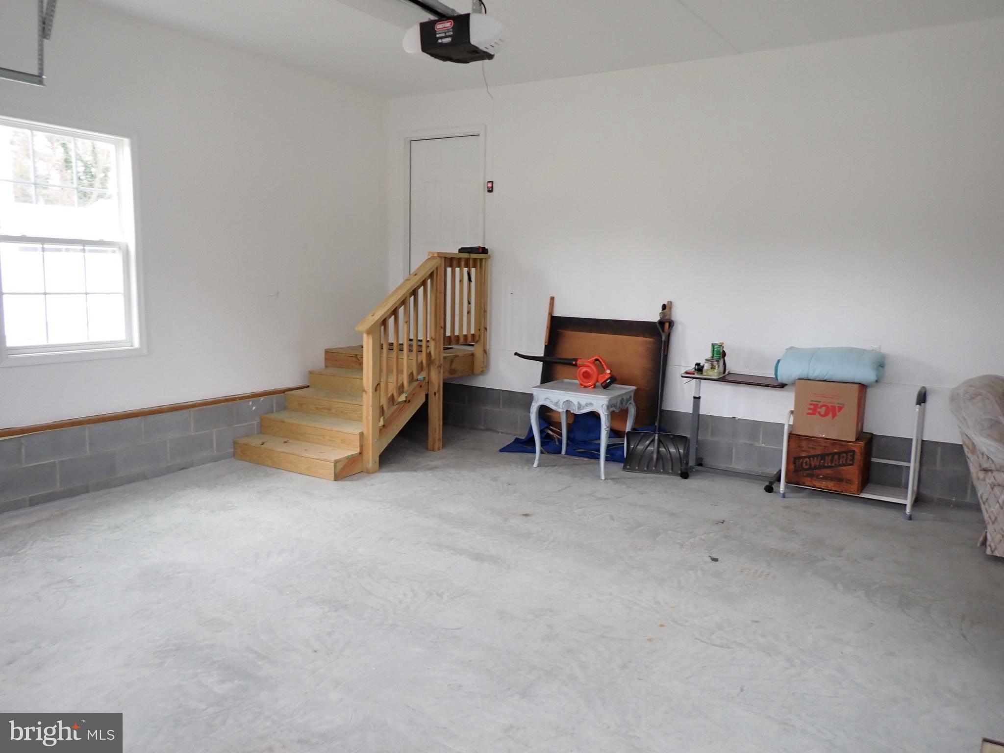 95 Rolando Drive Colonial Beach, VA 22443 - Photo 37 of 39 a view of a workspace with furniture and a window