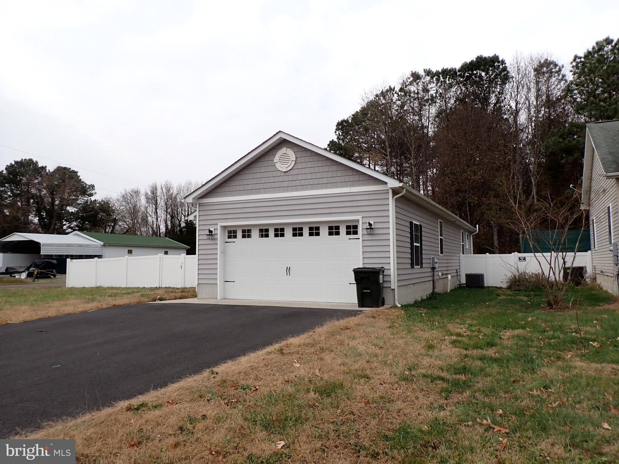 95 Rolando Drive Colonial Beach, VA 22443 - Photo 4 of 39 a view of a house with a yard