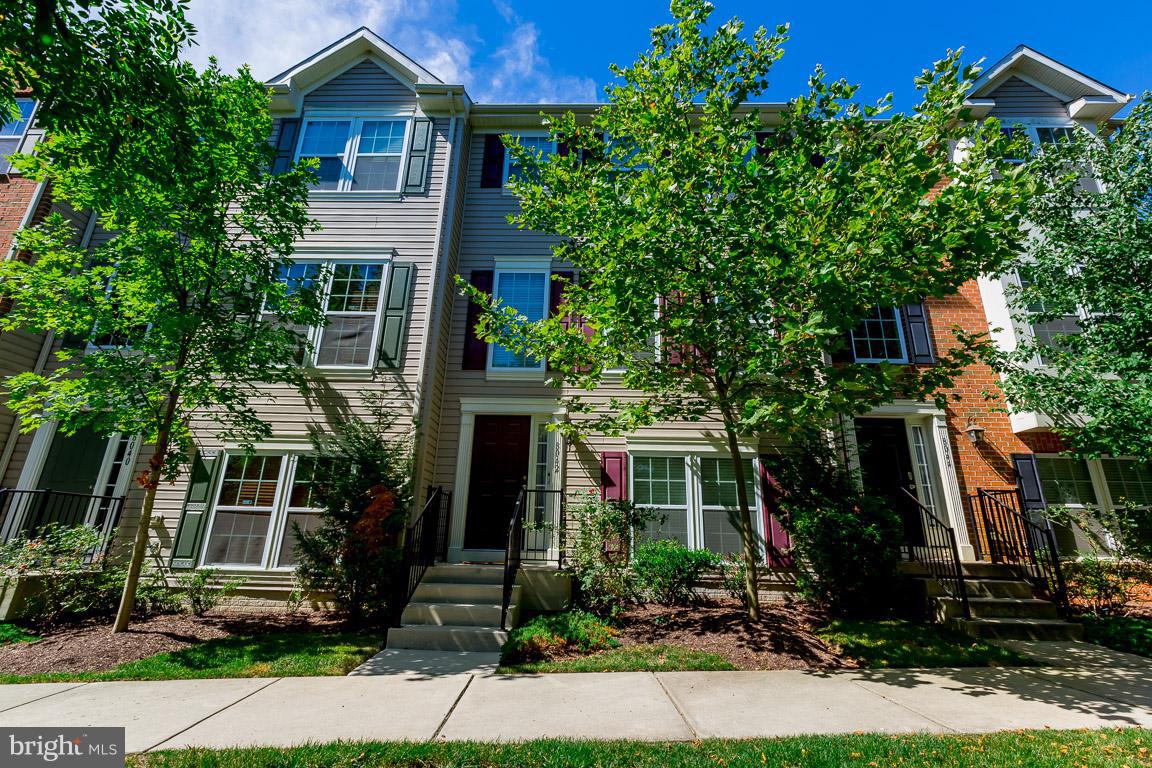 front view of a house with a small yard