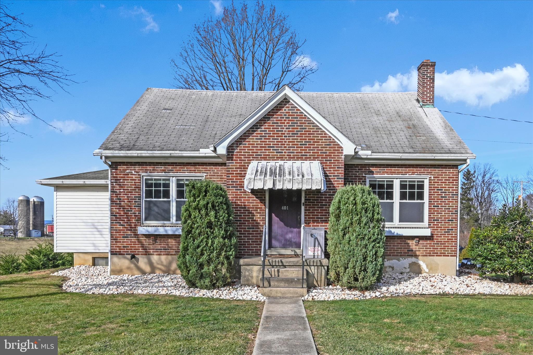 401 Park Road Fleetwood, PA 19522 - Photo 2 of 47 a front view of a house with garden