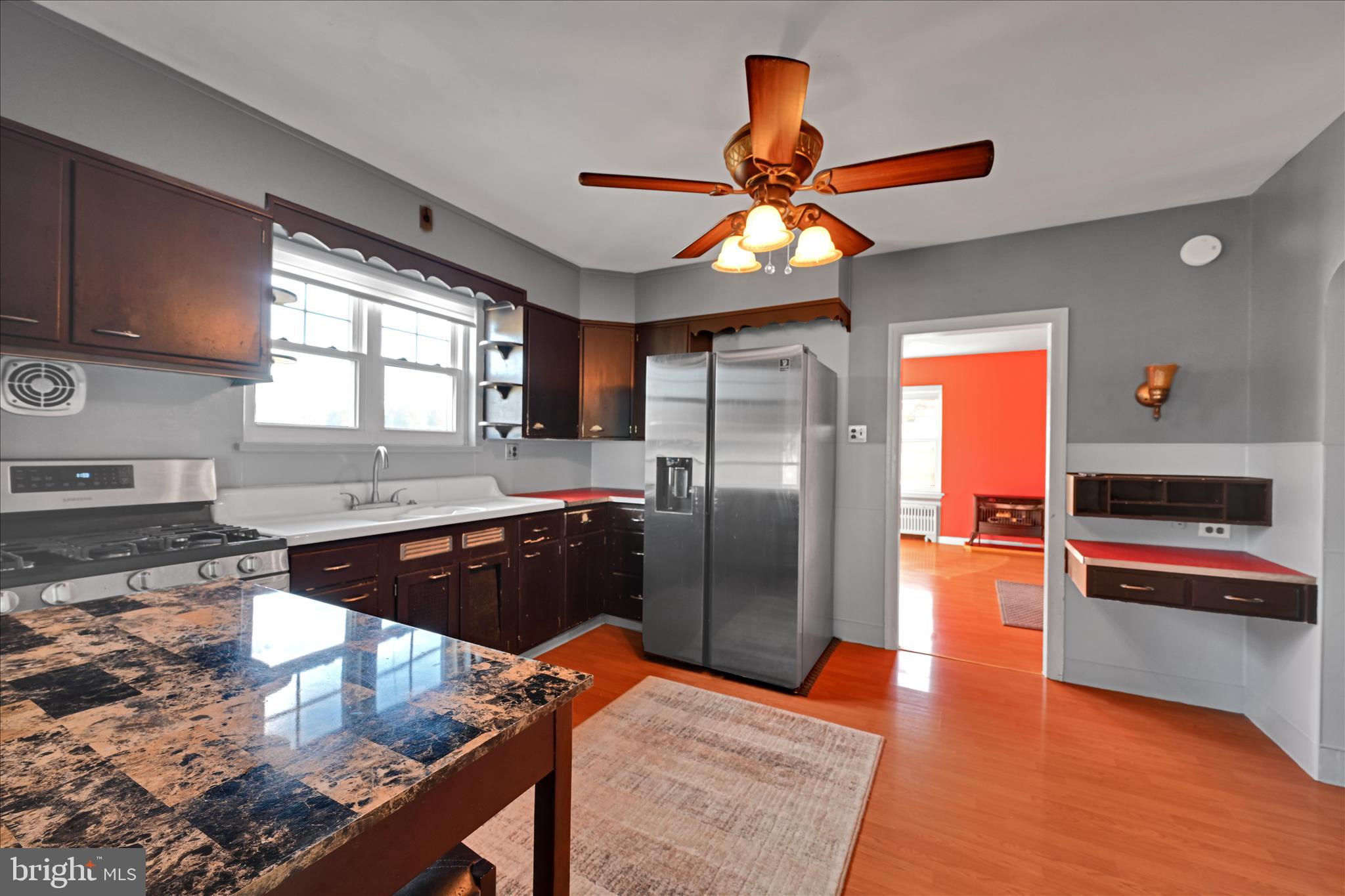 401 Park Road Fleetwood, PA 19522 - Photo 24 of 47 a kitchen with stainless steel appliances granite countertop a refrigerator a stove and a sink with granite countertops