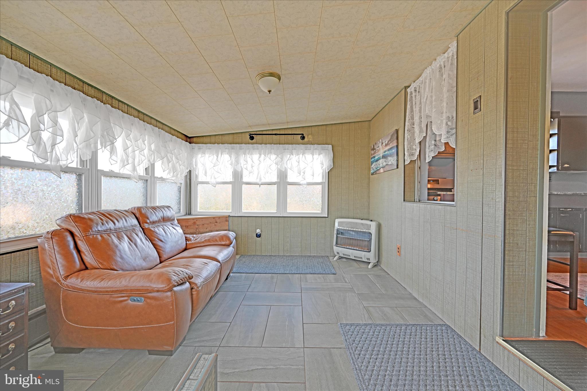401 Park Road Fleetwood, PA 19522 - Photo 28 of 47 a living room with furniture and a window