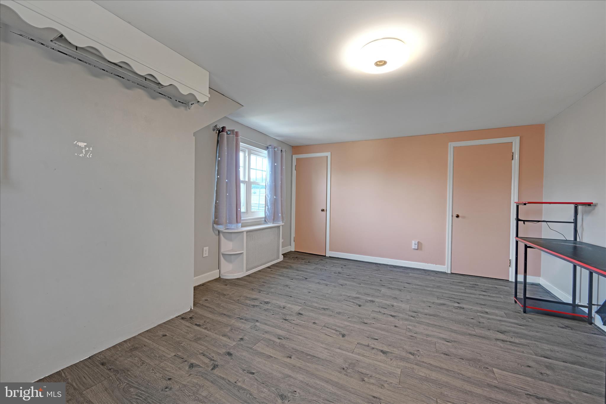 401 Park Road Fleetwood, PA 19522 - Photo 35 of 47 wooden floor in an empty room with a window