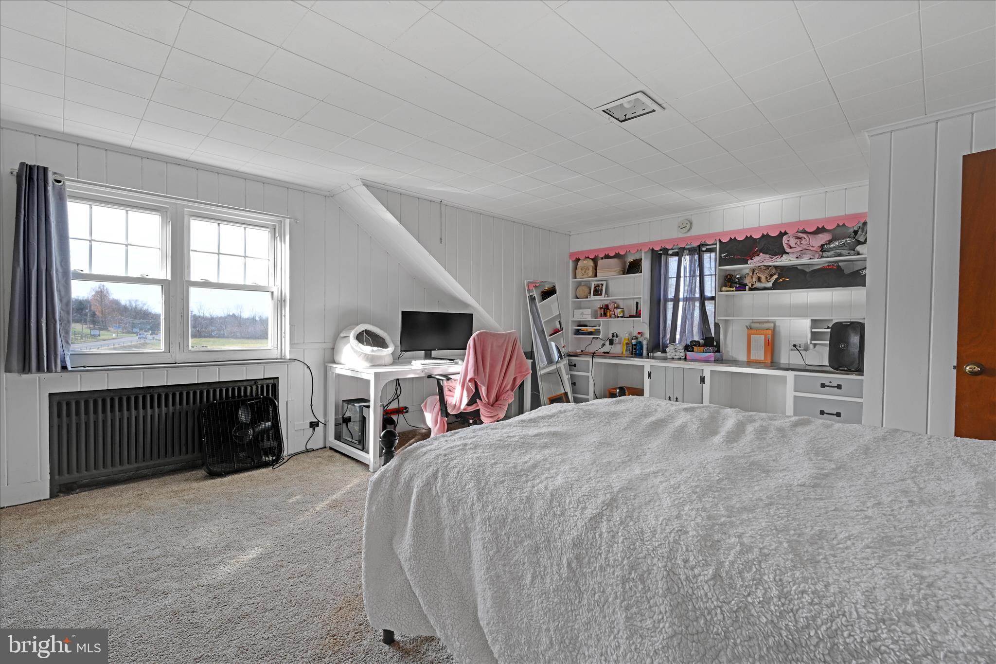 401 Park Road Fleetwood, PA 19522 - Photo 39 of 47 a bed room with a bed and a large window