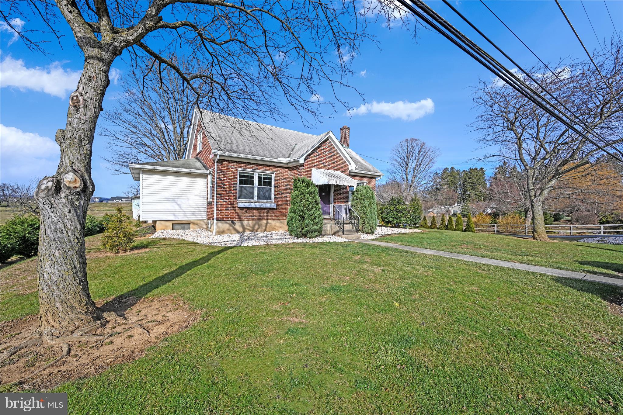 401 Park Road Fleetwood, PA 19522 - Photo 5 of 47 a front view of a house with garden