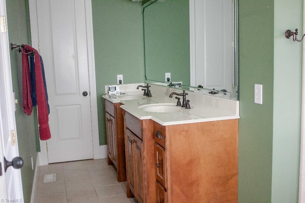 4801 Fox Chase Road Greensboro, NC 27410 - Photo 16 of 30 Double vanities in master bath