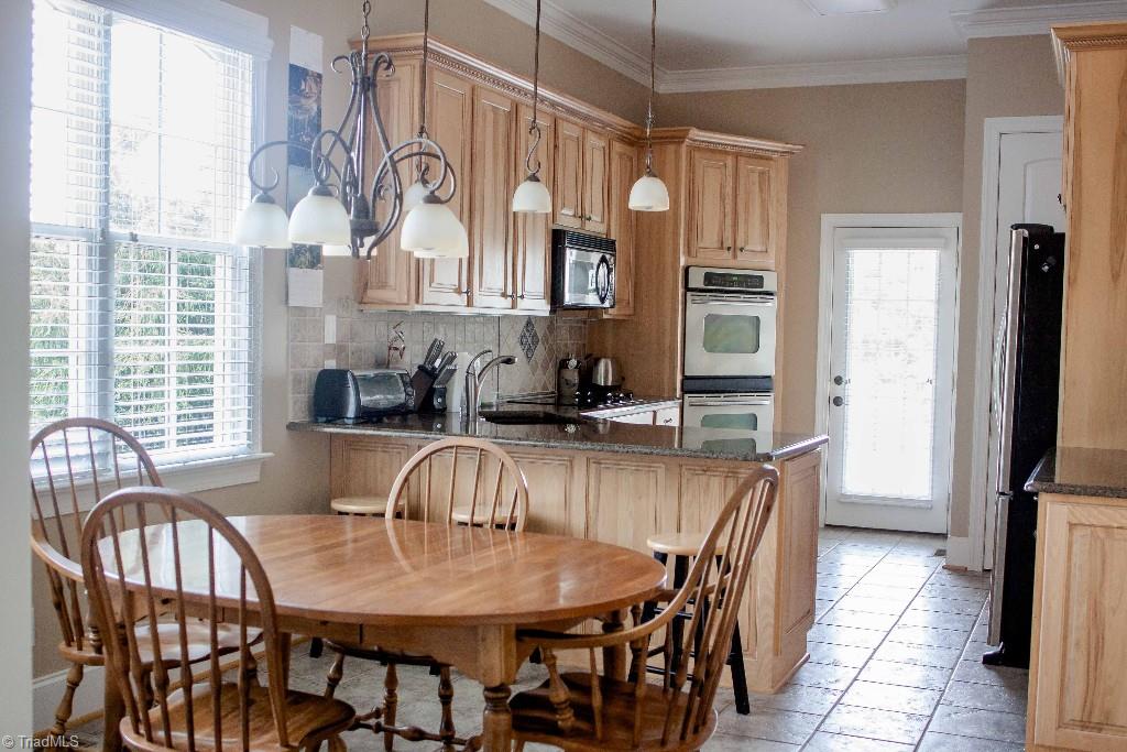 4801 Fox Chase Road Greensboro, NC 27410 - Photo 9 of 30 Breakfast Room. View into kitchen.