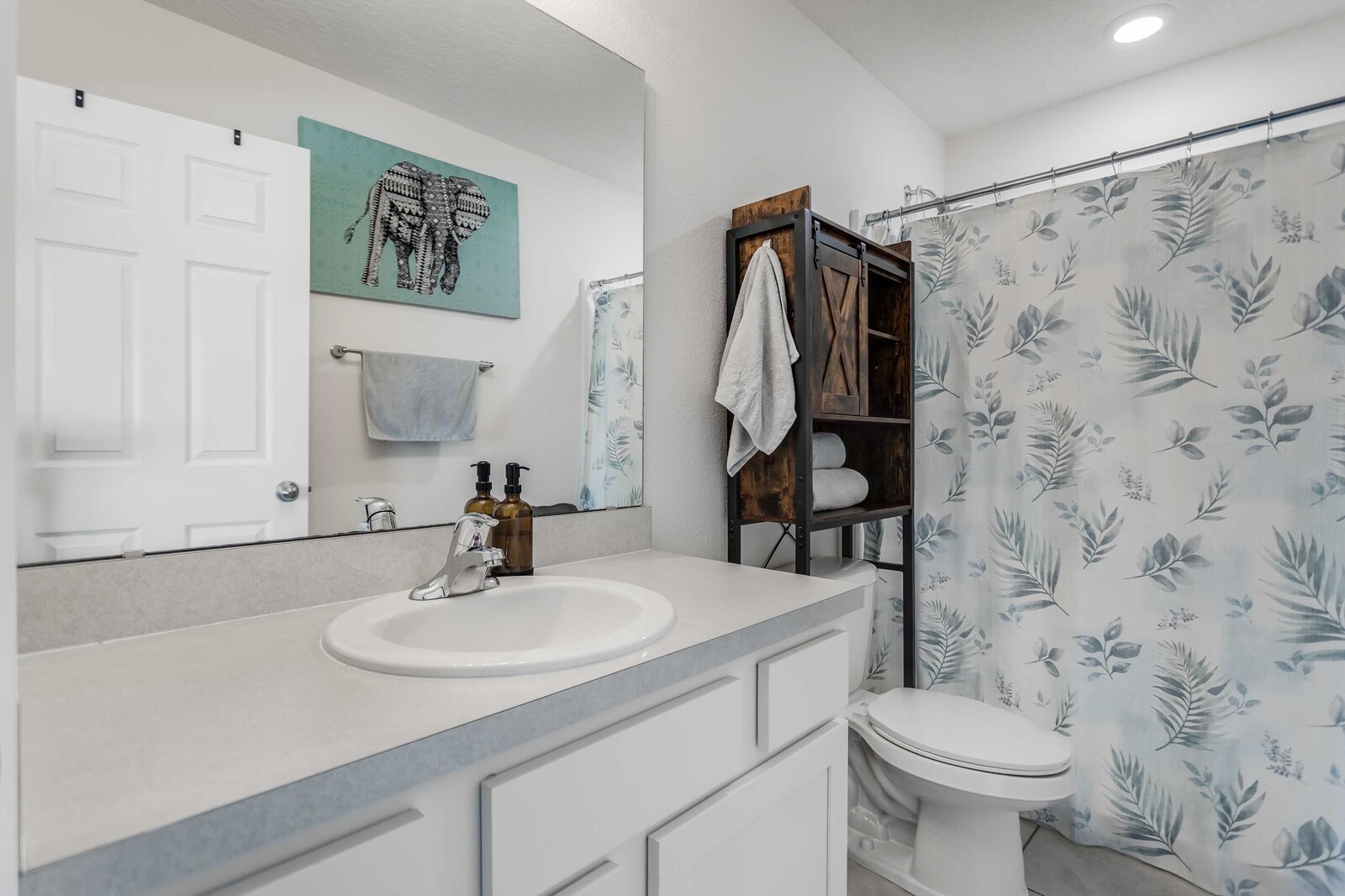86784 Mainline Road Yulee, FL 32097 - Photo 11 of 25 a bathroom with a sink toilet and shower
