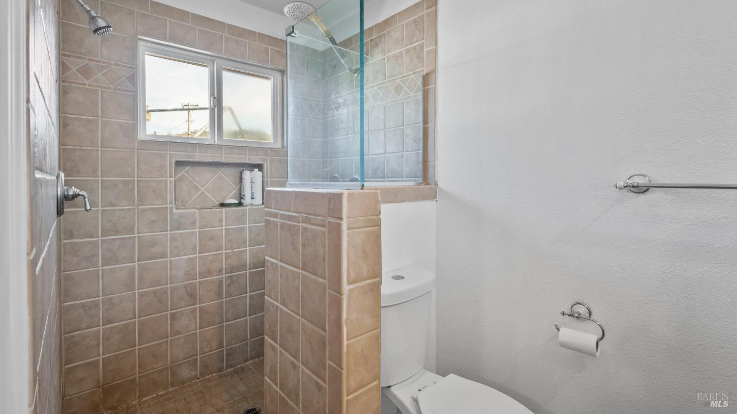 5036 Algiers Avenue Santa Rosa, CA 95409 - Photo 17 of 34 a bathroom with sink toilet and window
