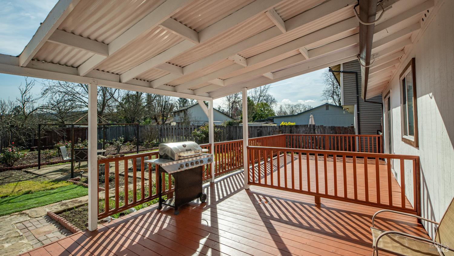 5036 Algiers Avenue Santa Rosa, CA 95409 - Photo 26 of 34 a view of balcony with couch and wooden floor