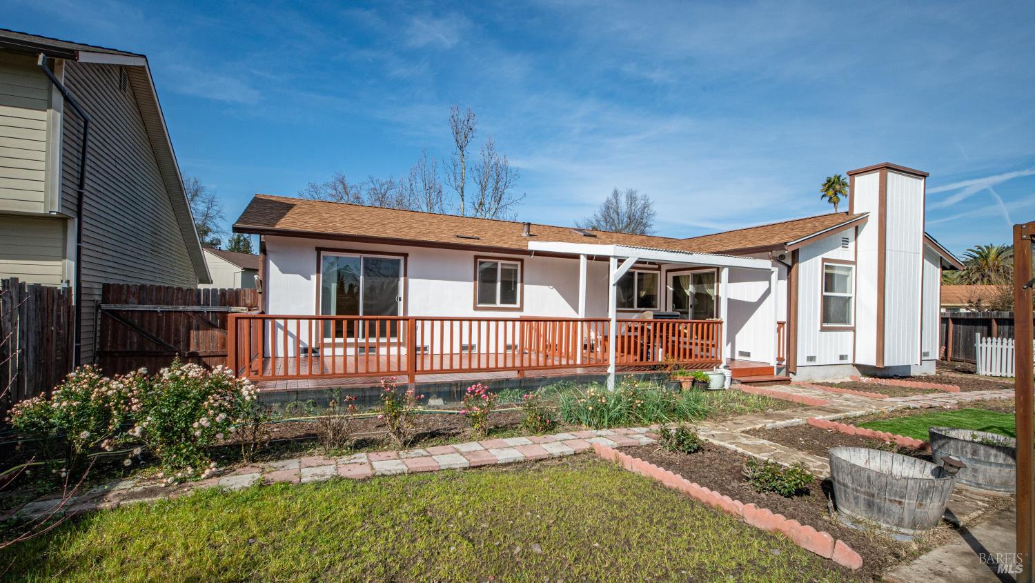 5036 Algiers Avenue Santa Rosa, CA 95409 - Photo 29 of 34 a front view of a house with a yard table and chairs