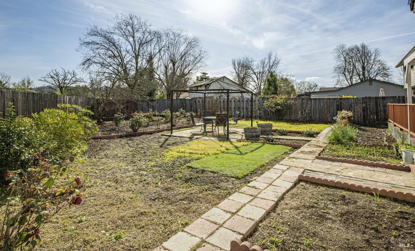 5036 Algiers Avenue Santa Rosa, CA 95409 - Photo 31 of 34 a view of a house with backyard and sitting area