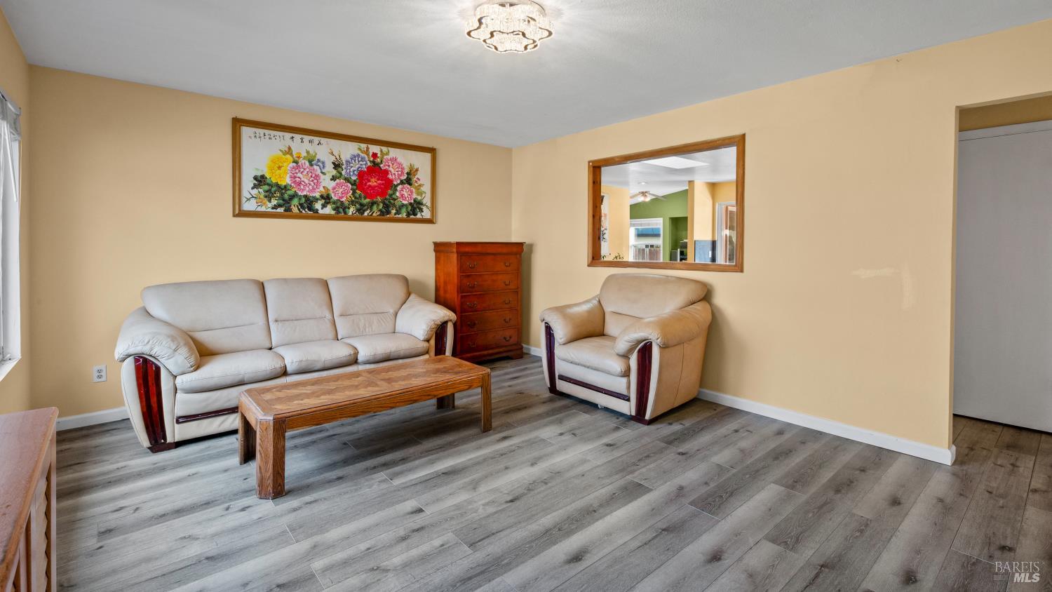 5036 Algiers Avenue Santa Rosa, CA 95409 - Photo 6 of 34 a living room with furniture and a wooden floor