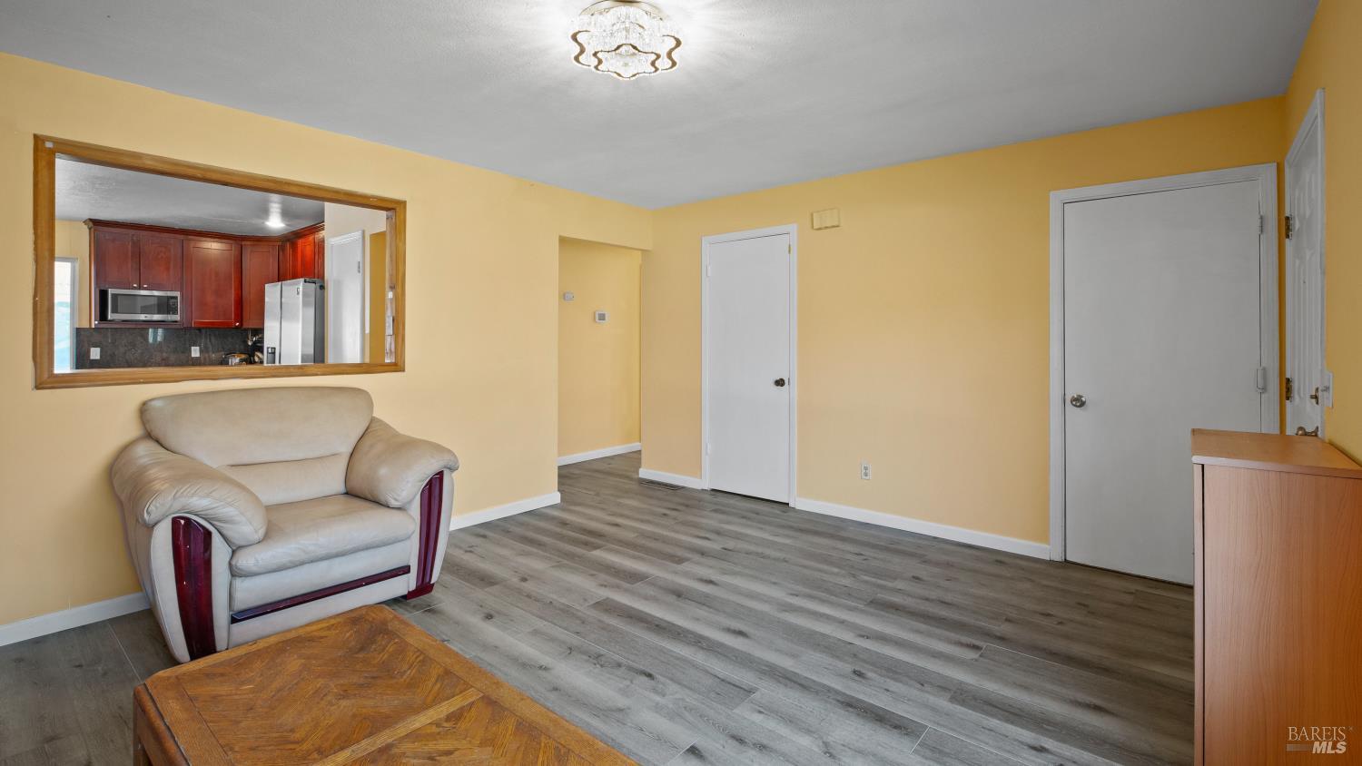 5036 Algiers Avenue Santa Rosa, CA 95409 - Photo 8 of 34 a living room with furniture and a wooden floor