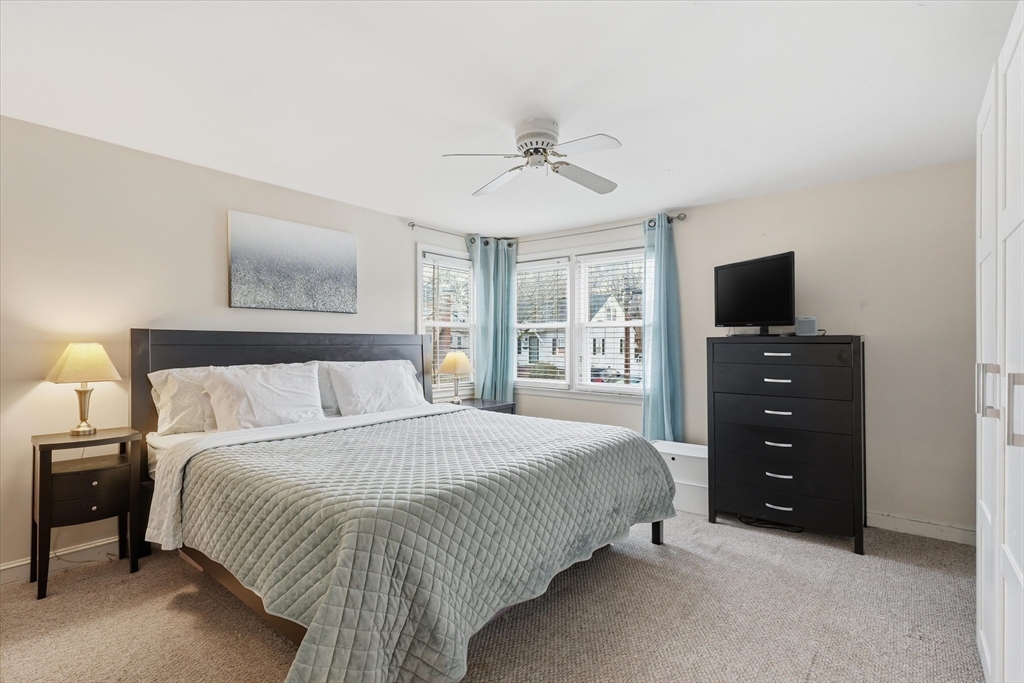 9 Pinewood Avenue Beverly, MA 01915 - Photo 18 of 41 a bedroom with a bed and a tv