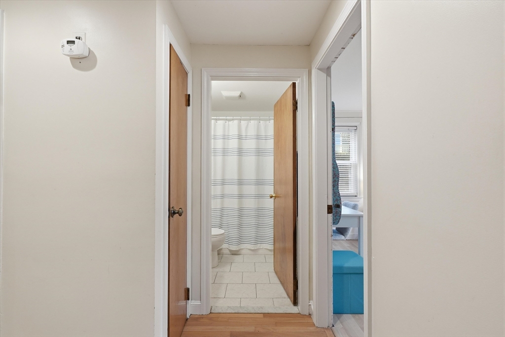 9 Pinewood Avenue Beverly, MA 01915 - Photo 20 of 41 a view of a bathroom with a glass door