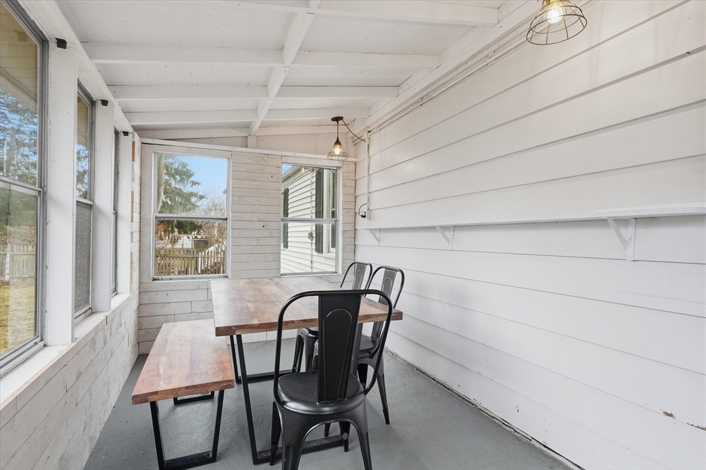 9 Pinewood Avenue Beverly, MA 01915 - Photo 27 of 41 a view of a dining room with furniture and window