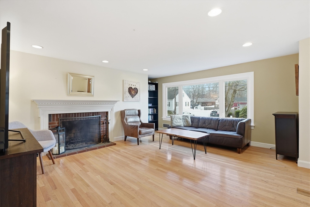 9 Pinewood Avenue Beverly, MA 01915 - Photo 3 of 41 a living room with furniture and a fireplace