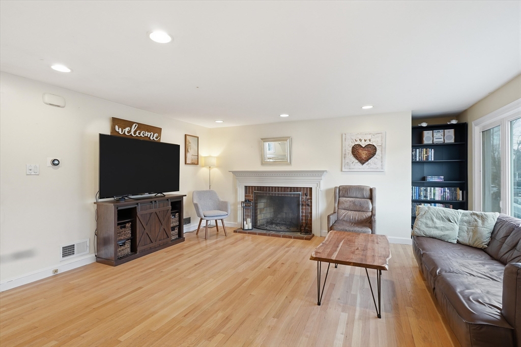 9 Pinewood Avenue Beverly, MA 01915 - Photo 4 of 41 a living room with furniture and a flat screen tv