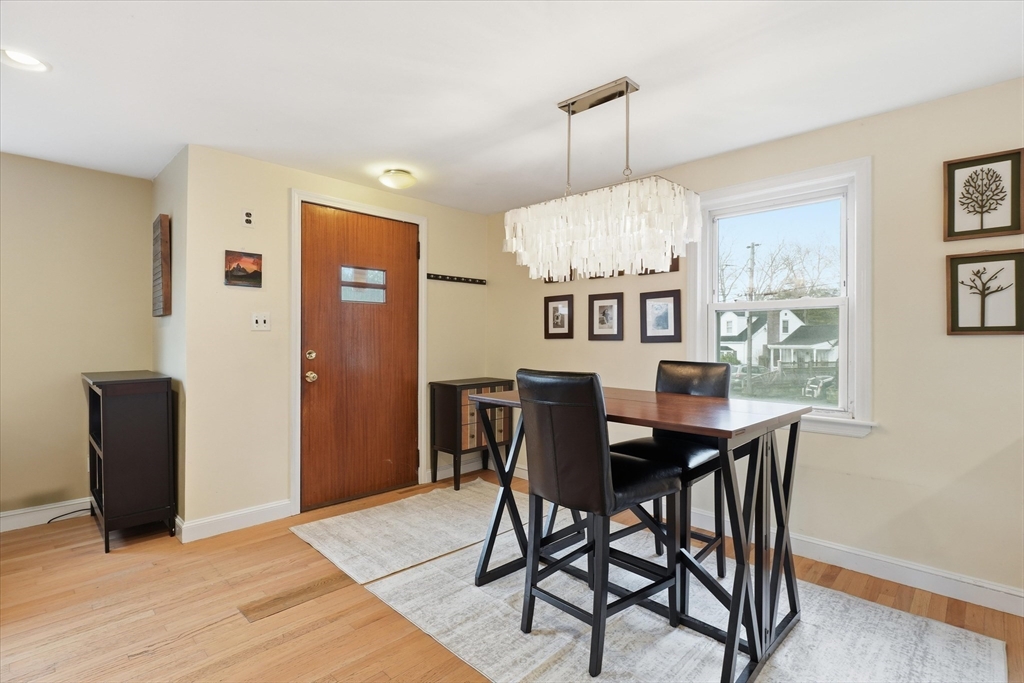 9 Pinewood Avenue Beverly, MA 01915 - Photo 5 of 41 a view of a dining room with furniture window and wooden floor