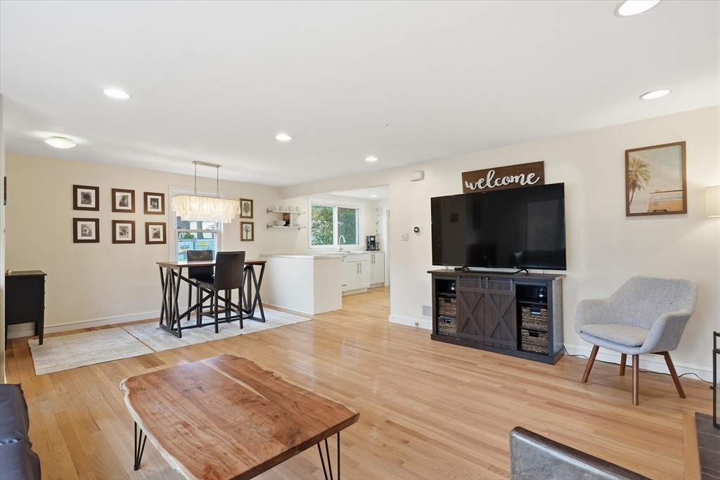 9 Pinewood Avenue Beverly, MA 01915 - Photo 6 of 41 a living room with furniture and a flat screen tv