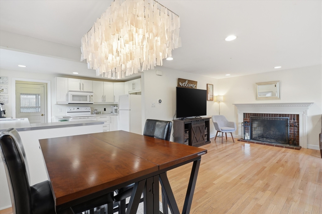 9 Pinewood Avenue Beverly, MA 01915 - Photo 7 of 41 a view of kitchen with cabinets and wooden floor