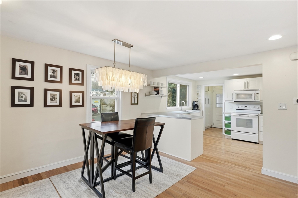 9 Pinewood Avenue Beverly, MA 01915 - Photo 8 of 41 a dining room with furniture and wooden floor