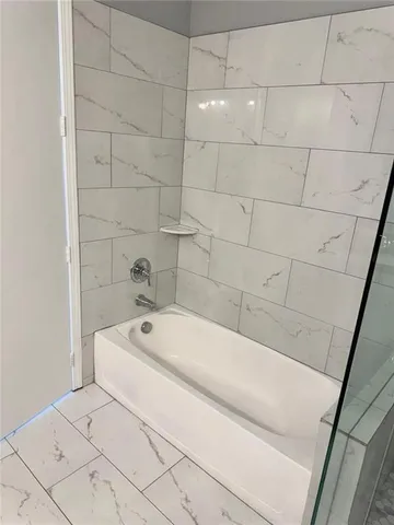 a bathroom with a bathtub