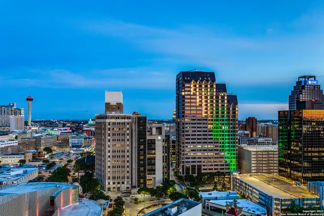 a city view with tall buildings